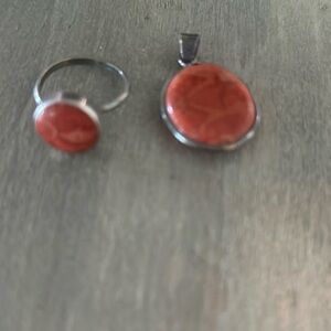 Orange stone pendant and ring set . Pendant is 3/4 inch long. Ring is size 6-7